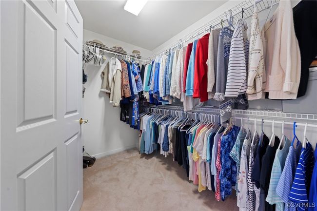 Walk in closet featuring carpet floors | Image 25