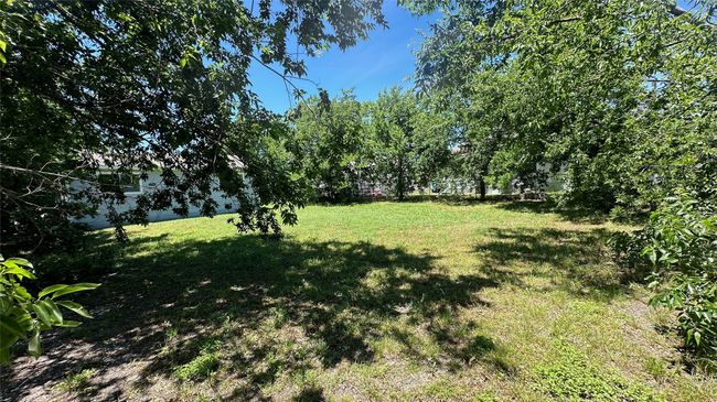 Spacious lot with room for outdoors toys and gardening | Image 35