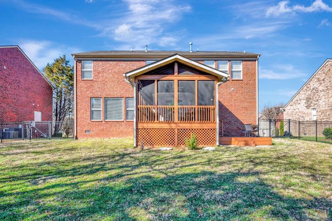 Level back yard is fully fenced. | Image 20