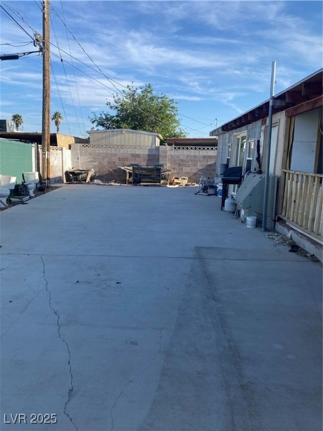 View of yard featuring a patio area and a fenced backyard | Image 20