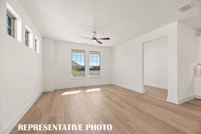 Open and inviting, friends and family will love gathering in your new lock and leave home! REPRESENTATIVE PHOTO | Image 4