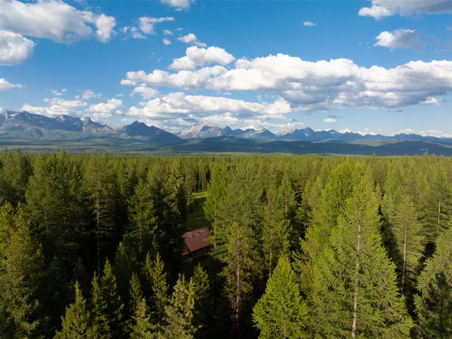 Aerial image showing proximity to Glacier National Park. | Image 27