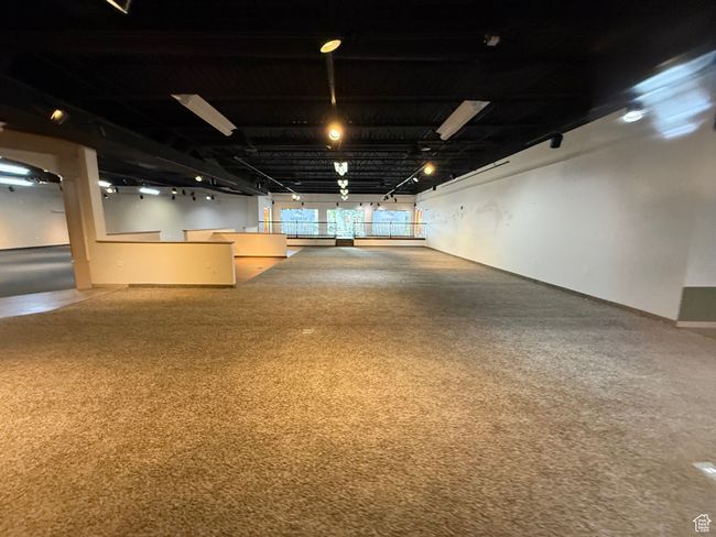 Basement featuring carpet | Image 12
