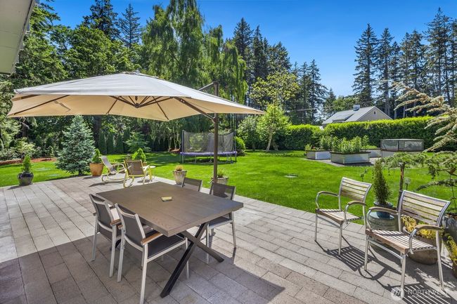 Trampoline shown in the background can stay with the house if desired. | Image 33