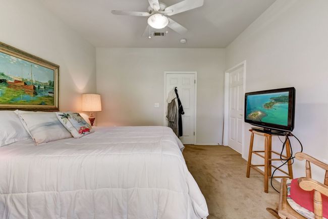 Primary Bedroom: "Wake up to natural light pouring through the bay window in your tranquil primary bedroom. ???? #SereneRetreat #MorningSun" | Image 12