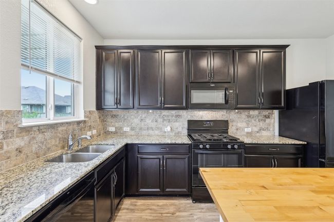 397 Bayberry Cir, House other with 3 bedrooms, 2 bathrooms and null parking in Buda TX | Image 17