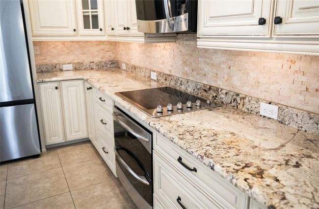 Second floor main living, kitchen, and dining. | Image 14