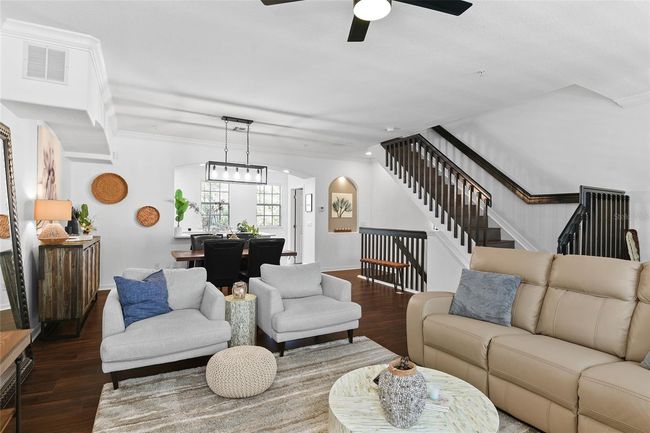 Stairs lead to third floor with master and another guest bedroom | Image 17