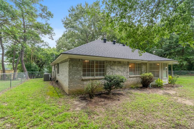 Back of property featuring roof with shingles | Image 28