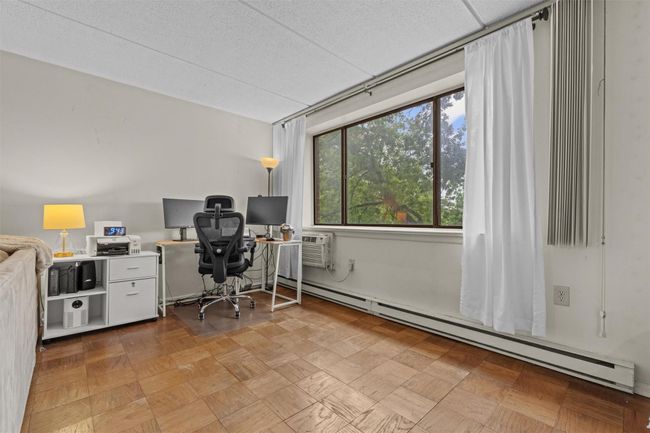 Office featuring a baseboard radiator | Image 6