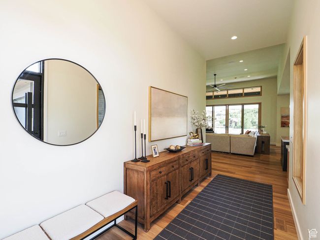 Corridor featuring light wood finished floors and recessed lighting | Image 24
