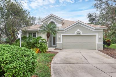 Front elevation showing the beautiful Florida landscaping | Image 1