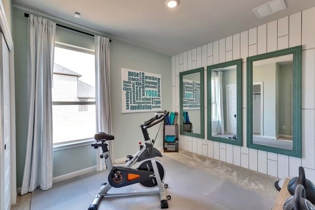 Exercise area featuring carpet | Image 11