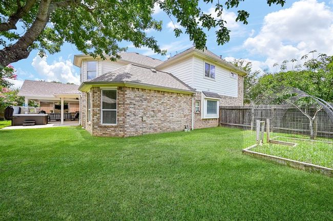More space in this side yard perfect for a swingset, garden area ideal for growing vegetables or climbing plants. | Image 6