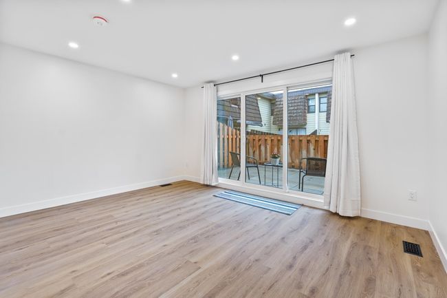 Unfurnished room featuring recessed lighting, visible vents, baseboards, and wood finished floors | Image 21
