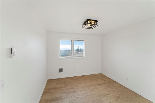 Empty room featuring light hardwood / wood-style flooring | Image 22