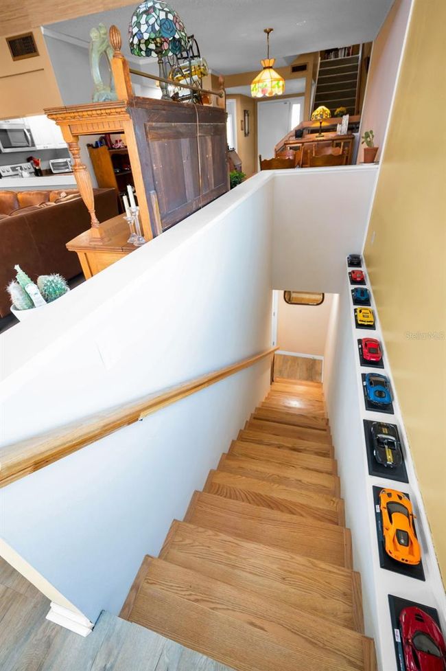 Descending down new indoor staircase to Bonus Room (not included in the square footage.) | Image 57
