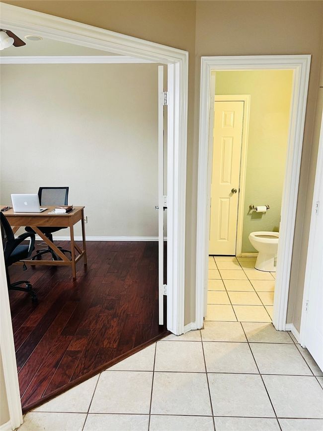 Tiled office with crown molding | Image 5