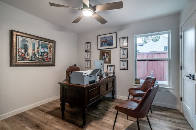 Home office featuring ceiling fan and wood finished floors | Image 24