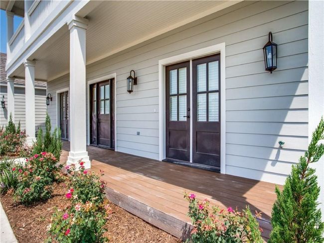 View of the porch of the two-story duplex that faces Cedar Street. | Image 13