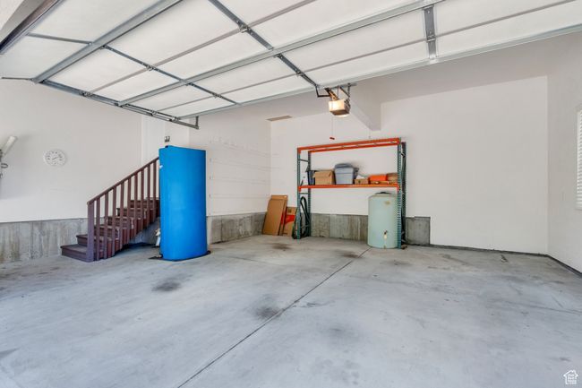 Garage with a garage door opener | Image 18