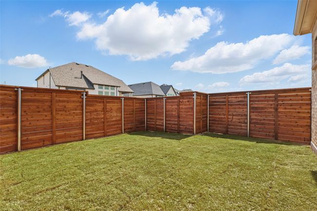 View of yard featuring a fenced backyard | Image 31
