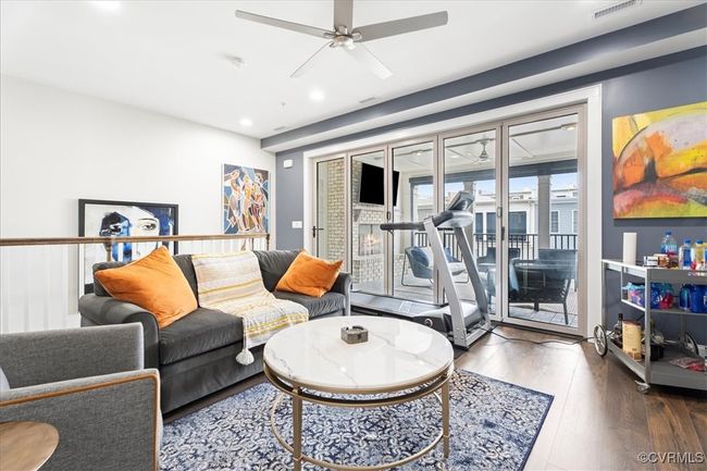 Living area with hardwood / wood-style floors, a ceiling fan, visible vents, and recessed lighting | Image 29