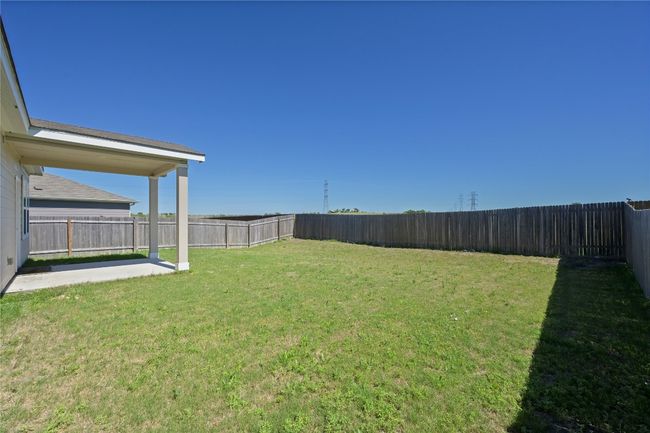View of yard featuring a patio and a fenced backyard | Image 36