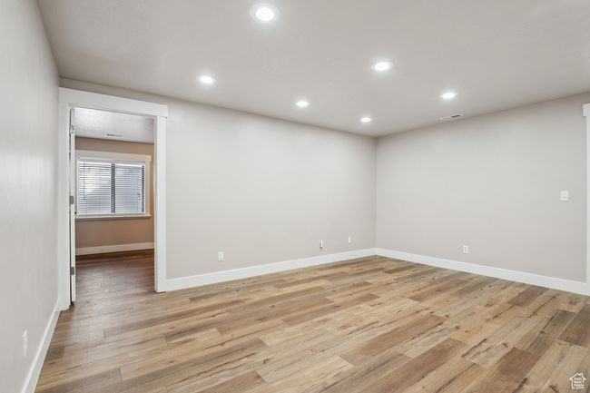 Spare room featuring light hardwood / wood-style floors | Image 26