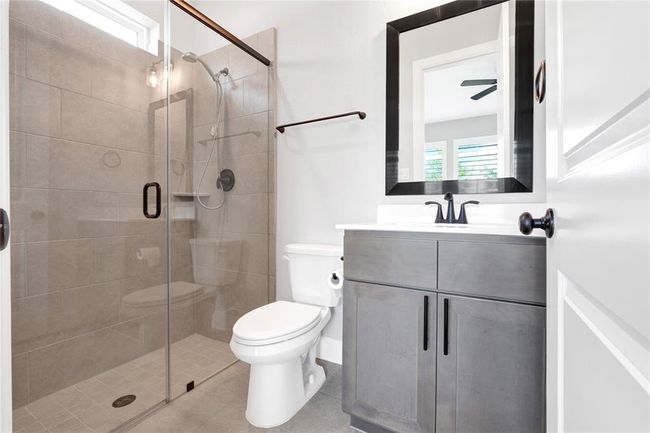 Upgraded glass shower inside of bedroom downstairs! Upgraded cabinets with hardware | Image 34