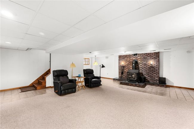 HUGE FAMILY ROOM WITH WOOD BURNER IN THE LOWER LEVEL OF THE HOME. COZY UP DURING THE COLDER WINTER DAYS. | Image 20