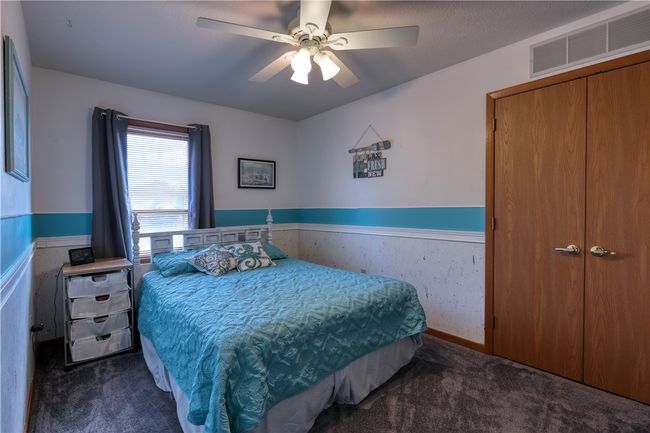 One of the four bedrooms. | Image 15