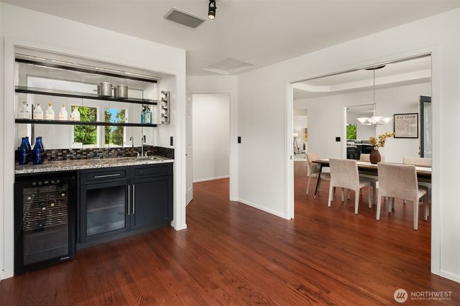 cocktail lounge or close the French doors and make this a 4th bedroom or office. | Image 12