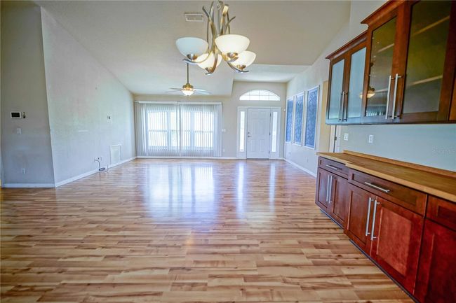 Dining room with buffet and great room | Image 14
