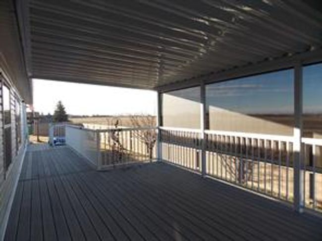 77 - 5210 65 Ave, Home with 3 bedrooms, 2 bathrooms and 3 parking in Olds AB | Image 41