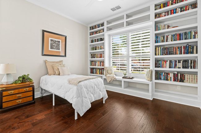 Perfect for long-term guests or multigenerational living, this private suite is located at the front of the home. | Image 24