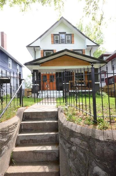 View of front facade with a porch | Image 1