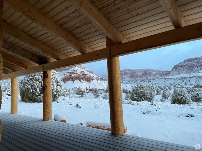 Snow covered deck featuring a mountain view | Image 106