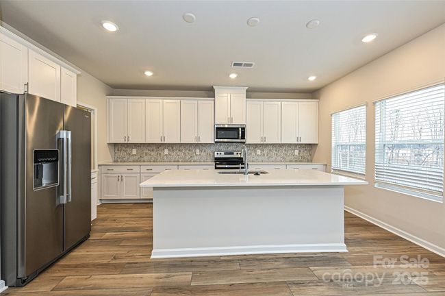 Photo is not of the actual home, but is an inspirational photo of builder’s model home and may depict options, furnishings, and/or decorator features that are not included | Image 6