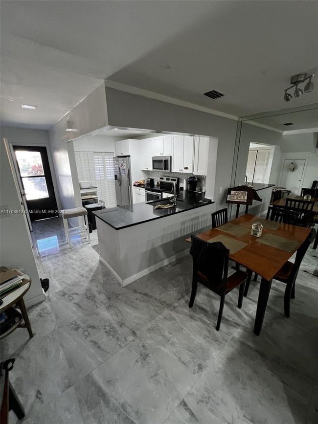4389 Carambola Cir N, Condo with 2 bedrooms, 3 bathrooms and null parking in Coconut Creek FL | Image 13
