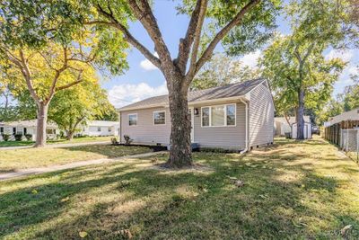 View of home's exterior with a yard | Image 3