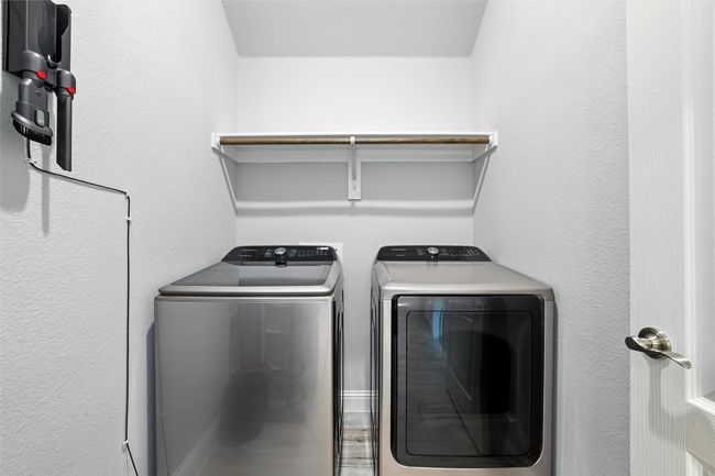 Laundry room with washing machine and clothes dryer | Image 33