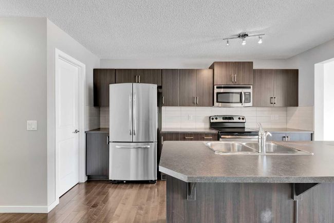 117 Sunset Common, Home with 3 bedrooms, 2 bathrooms and 2 parking in Cochrane AB | Image 4