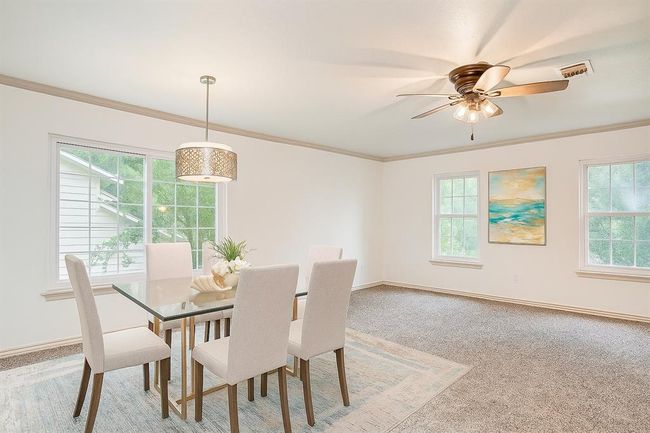 Virtually staged dining room. | Image 13