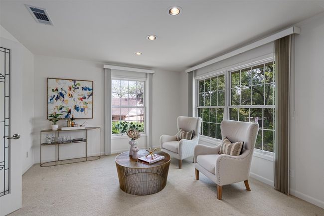 This living area can also be used as a formal dining area if desired | Image 11