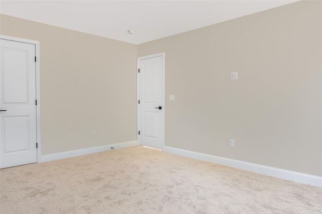 Spare room with baseboards, ceiling fan, and carpet flooring | Image 28