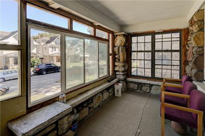 Sunroom / solarium featuring a wealth of natural light | Image 2