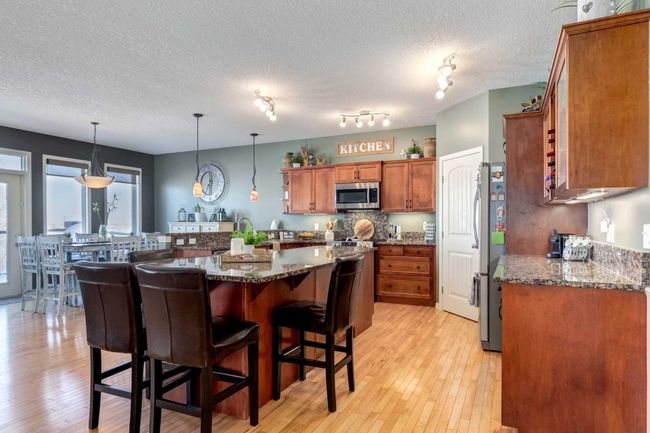 569 Boulder Creek Circle Se, House other with 4 bedrooms, 3 bathrooms and 6 parking in Langdon AB | Image 11