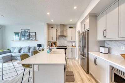 748 Seton Cir Se, House other with 4 bedrooms, 3 bathrooms and 4 parking in Calgary AB | Image 3