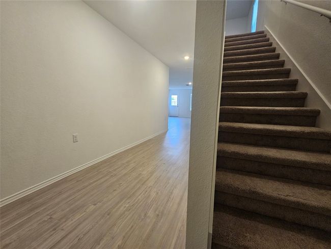 Staircase with baseboards, recessed lighting, and wood finished floors | Image 11